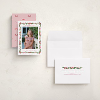 This is a candy cane petite holiday cards with standard by Sarah Knight called boughs of bows printing on recycled smooth signature in petite