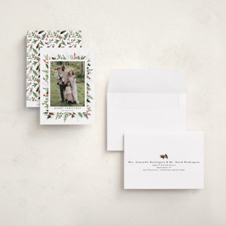 This is a peppermint petite holiday cards with standard by Susan Moyal called classic greenery printing on recycled smooth signature in petite