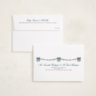 This is a winter berry petite holiday cards with standard by Susan Moyal called holly & bows printing on recycled smooth signature in petite