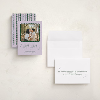 This is a sugar plum petite holiday cards with standard by Lauren Jopling called squiggle and stars printing on recycled smooth signature in petite