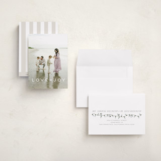 This is a snow petite holiday cards with standard by Kate Ross called love joy printing on recycled smooth signature in petite