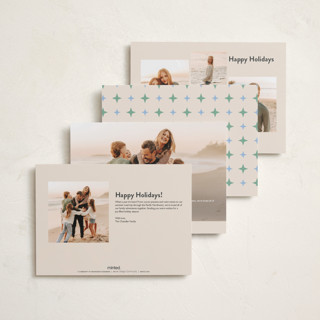 This is a spearmint petite holiday cards with standard by Carolyn MacLaren called happy colors printing on recycled smooth signature in petite