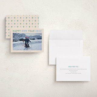 This is a spearmint petite holiday cards with standard by Carolyn MacLaren called happy colors printing on recycled smooth signature in petite