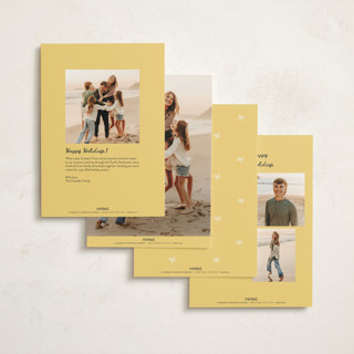 This is a champagne non photo holiday cards with standard by Kamala Nahas called cheers printing on signature in standard