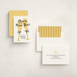 This is a champagne non photo holiday cards with standard by Kamala Nahas called cheers printing on signature in standard