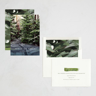 This is a pine non photo holiday cards with standard by Holly Whitcomb called peaceful forest printing on signature in standard