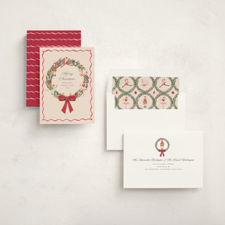 This is a berry non photo holiday cards with standard by Teju Reval called nutcracker wreath printing on signature in standard