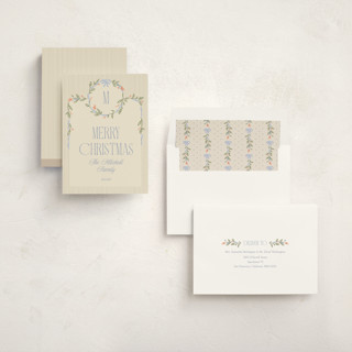 This is a periwinkle non photo holiday cards with standard by Robert and Stella called wreath frame printing on signature in standard