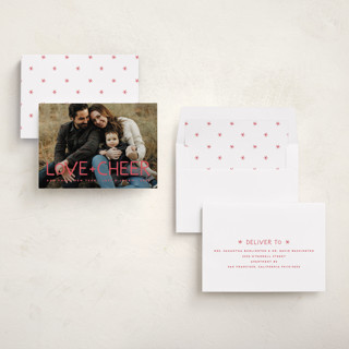 This is a petal new year photo cards with standard by Snow and Ivy called love & cheer printing on recycled smooth signature in standard