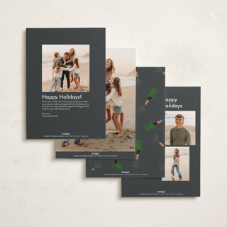 This is a charcoal new year photo cards with standard by Shari Margolin called popping bottles printing on recycled smooth signature in standard