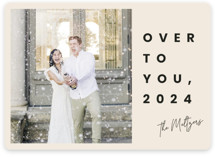 This is a beige new year photo card by Adelyn T. called Over to you with standard printing on recycled smooth signature in standard.