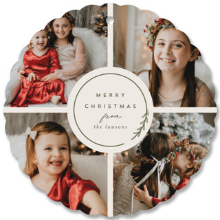 This is a green holiday card ornament by Brianne Larsen called Round with standard printing on signature in ornament.