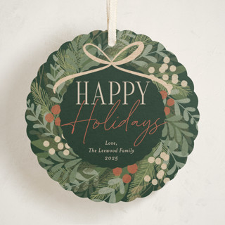 This is a pine needle holiday card ornaments with standard by Erin German called botanical wreath printing on signature in ornament