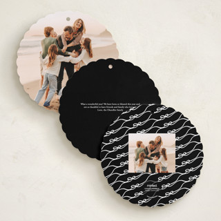 This is a coal holiday card ornaments with standard by Kaydi Bishop called bow tied printing on recycled smooth signature in ornament