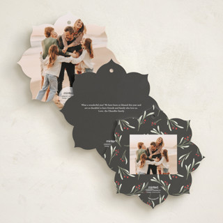 This is a coal holiday card ornaments with standard by Randi Cirelli called merry & new printing on recycled smooth signature in ornament