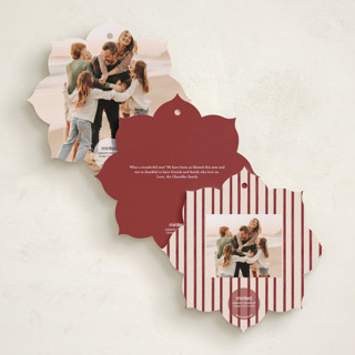 This is a cranberry holiday card ornaments with standard by Jenna Holcomb called bow ornament printing on recycled smooth signature in ornament