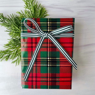 This is a green holiday decorations by Honey Silks Co called forest green stripe 3/8" x 15 feet holiday ribbon in standard