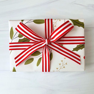 This is a red holiday decorations by Honey Silks Co called red and white holiday stripe 5/8" x 5 yards in standard