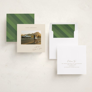 This is a latte foil pressed holiday cards with foil pressed by Kamala Nahas called merry slide printing on recycled smooth signature in square