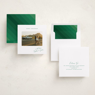 This is a cedar foil pressed holiday cards with foil pressed by Kamala Nahas called merry slide printing on recycled smooth signature in square