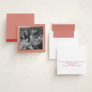 This is a ruby foil pressed holiday cards with foil pressed by Annie Shapiro called spirit printing on recycled smooth signature in square