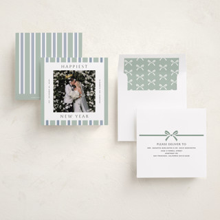 This is a wintermint foil pressed holiday cards with foil pressed by Yuliya Evseeva called holiday rhythm printing on recycled smooth signature in square