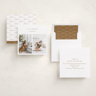 This is a almond foil pressed holiday cards with foil pressed by Bethan called minimal duo printing on recycled smooth signature in square