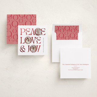 This is a snow foil pressed holiday cards with foil pressed by Carolyn Kach called peace love & joy printing on recycled smooth signature in square
