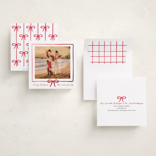 This is a rouge foil pressed holiday cards with foil pressed by Jennifer Lew called lil bow printing on recycled smooth signature in square