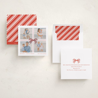 This is a poinsettia foil pressed holiday cards with foil pressed by Brooke Chandler called square present printing on recycled smooth signature in square