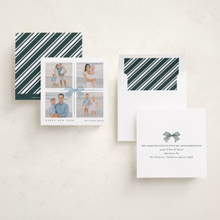 This is a night foil pressed holiday cards with foil pressed by Brooke Chandler called square present printing on recycled smooth signature in square