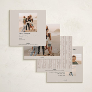 This is a eggnog foil pressed holiday cards with foil pressed by Amy Kross called wrapped wreath printing on signature in square