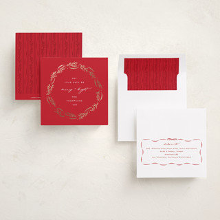 This is a poinsettia foil pressed holiday cards with foil pressed by Amy Kross called wrapped wreath printing on signature in square