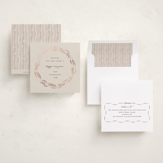 This is a eggnog foil pressed holiday cards with foil pressed by Amy Kross called wrapped wreath printing on signature in square