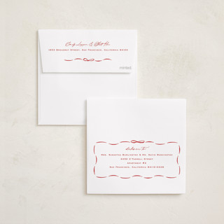 This is a poinsettia foil pressed holiday cards with foil pressed by Amy Kross called wrapped wreath printing on signature in square