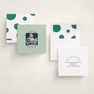 This is a mistletoe holiday photo cards with standard by Christie Garcia called circale printing on recycled smooth signature in square