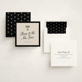 This is a caviar holiday photo cards with standard by Cindy Reynolds called bubbly clink printing on signature in square