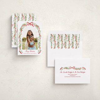 This is a cardinal holiday photo cards with standard by Sarah Knight called ribbon arch printing on recycled smooth signature in standard