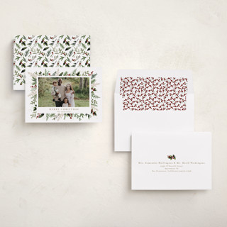 This is a mulled wine holiday photo cards with standard by Susan Moyal called classic greenery printing on recycled smooth signature in standard