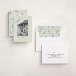 This is a lime holiday photo cards with standard by Angela Garrick called hung holly printing on recycled smooth signature in standard