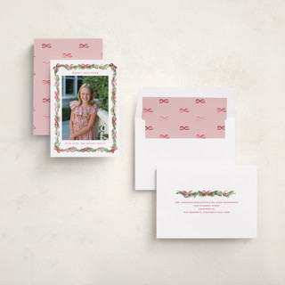 This is a candy cane holiday photo cards with standard by Sarah Knight called boughs of bows printing on recycled smooth signature in standard