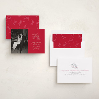 This is a candy cane holiday photo cards with standard by Randi Cirelli called newlywed toast printing on recycled smooth signature in standard