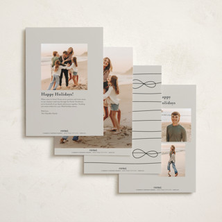 This is a putty holiday photo cards with standard by Lauren Chism called cascading bow printing on recycled smooth signature in standard