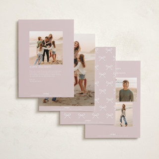 This is a winter rose holiday photo cards with standard by Emily Betts called scallop bow printing on recycled smooth signature in standard