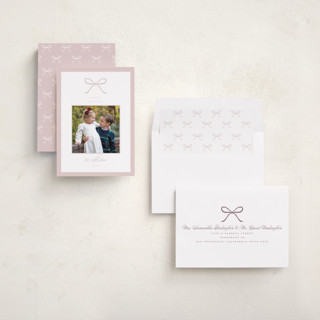 This is a winter rose holiday photo cards with standard by Emily Betts called scallop bow printing on recycled smooth signature in standard