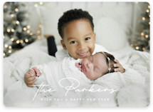 This is a white holiday photo card by Ekko Studio called Stylish Surname with standard printing on smooth signature in standard.