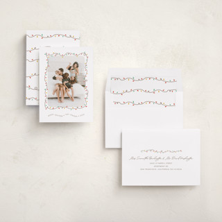 This is a frosting holiday photo cards with standard by Holly Whitcomb called crazy lights printing on recycled smooth signature in standard