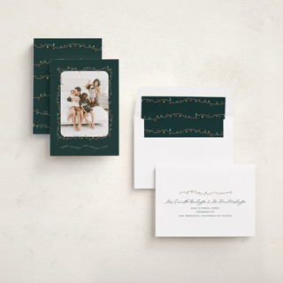 This is a forest holiday photo cards with standard by Holly Whitcomb called crazy lights printing on recycled smooth signature in standard