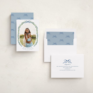 This is a powder holiday photo cards with standard by Sarah Knight called frosted printing on recycled smooth signature in standard