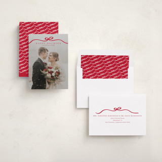 This is a cardinal holiday photo cards with standard by Kaydi Bishop called bow tied printing on recycled smooth signature in standard